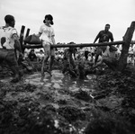 Alpha Phi Member in Mud Pit by East Texas State University