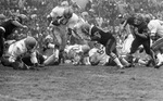 Kenneth Parks Running the Ball by East Texas State University