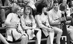 Cheerleaders on Bleachers by East Texas State University