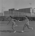 Doris Miller and Sheila Allen During Relay Race by East Texas State University