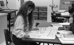 Student Making Poster by East Texas State University