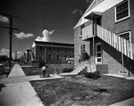 Boy Riding Tricycle Near the South Apartments by East Texas State College
