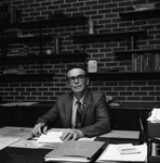 Welcome Ernest Wright at Desk by East Texas State University