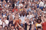 People Cheering on Bleachers by East Texas State University