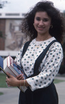 Student Holding Textbooks by East Texas State University