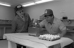 Student Working with Eggs by East Texas State University
