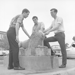Lambda Chi Alpha Members Washing Resting Lion by East Texas State University
