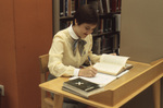 Student Studying in Library by East Texas State University
