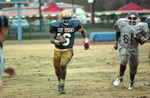 Michael Hightower with the Ball by East Texas State University