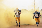 Brian Gow and Chuck Hill Entering the Stadium by East Texas State University