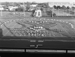 Marching Band on Football Field by East Texas State University