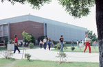People Walking Near James G. Gee Library by East Texas State University