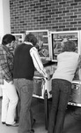 Students Playing Pinball by East Texas State University