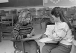 Two Students at Desk by East Texas State University
