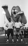 Two Students in Front of King Pride by East Texas State University