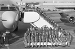 Alpha Phi Members Posing with Airplane by East Texas State University