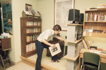 Student with Record in Dorm Room by East Texas State University
