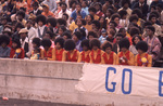 Sports Spectators Wearing Red and Gold by East Texas State University