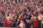Sports Crowd with "L" Hand Signs by East Texas State University