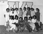 Alpha Kappa Alpha Group Members Posing with Sign by East Texas State University