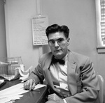 Dr. Robert McCloud at His Desk by East Texas State College